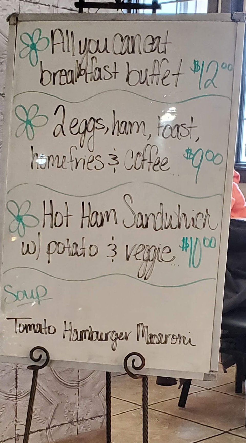 Menu board showing comfort food choices.